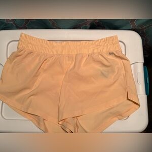 DSG Stride Mid-Rise Shorts in Light Peach